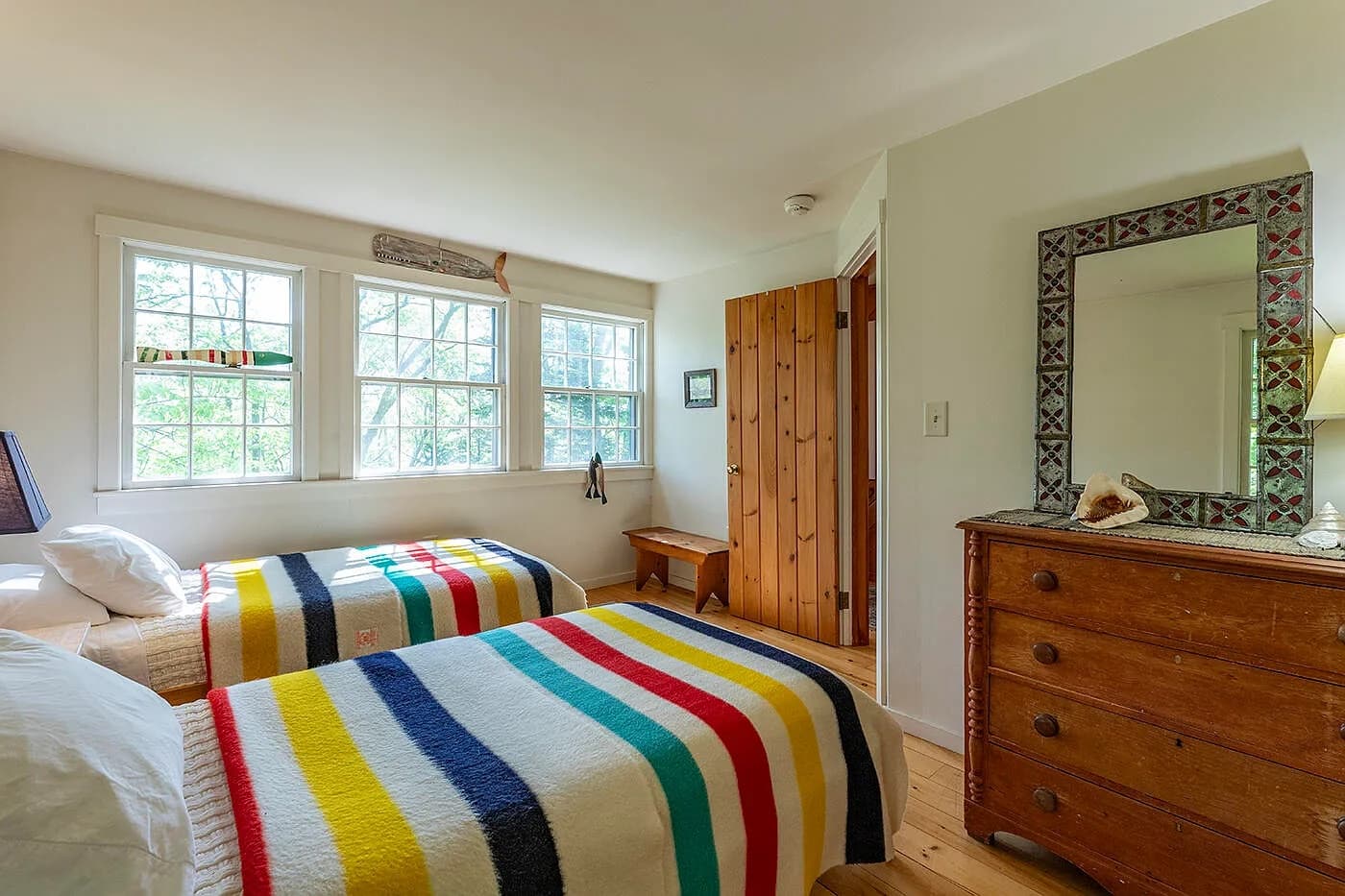 Bedroom 1 with two single beds and Hudson Bay blankets
