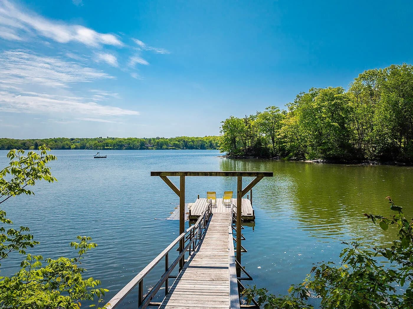 Private dock extending over Collins Cove
